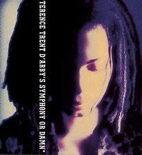 Album cover of "TERENCE TRENT D'ARBY - SYMPHONY OR DAMN (PREOWNED CD)" featuring a close-up, side profile of terence trent d'arby in low lighting, considered rare