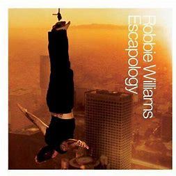 Album cover of ROBBIE WILLIAMS - ESCAPOLOGY (PREOWNED CD) showing the artist hanging upside down from a skyscraper at sunset, featuring rare and collectable vinyl.