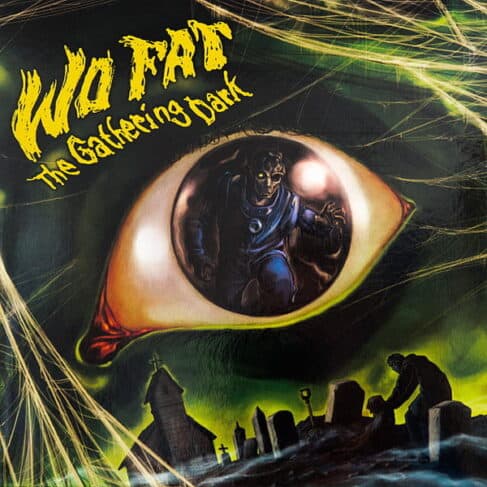An eerie album cover featuring a large, realistic eye with the image of a sinister, hooded figure inside its pupil. Below, graveyard silhouettes, a person digging, and a distorted title reading "WO FAT - THE GATHERING DARK (PREOWNED VINYL LP) (VG+/VG+)" add to the dark, ominous atmosphere—perfect for any Records aficionado on the Vinyl Gold Coast.